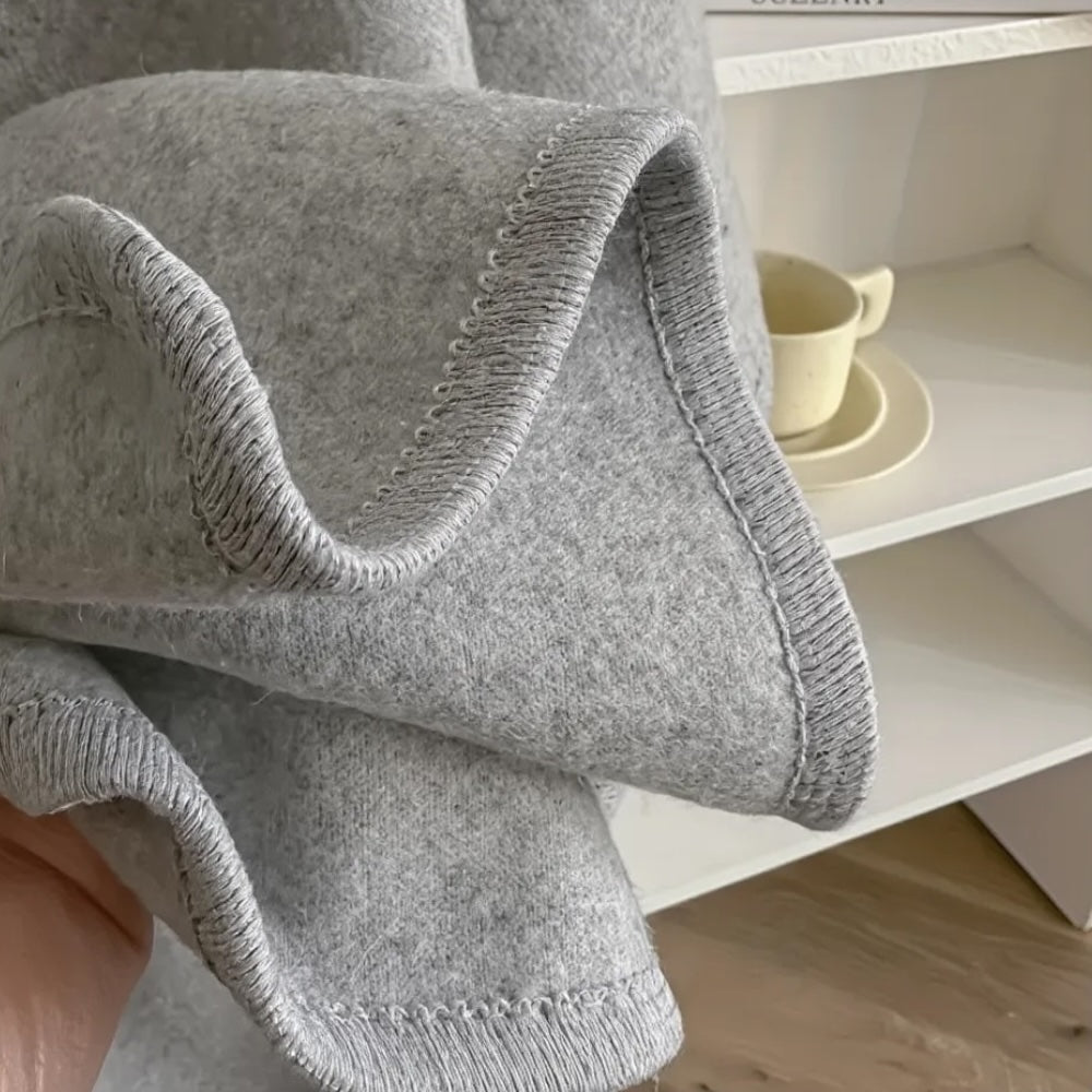 Aurora™️ – Umhüllender Poncho zeitloser Eleganz